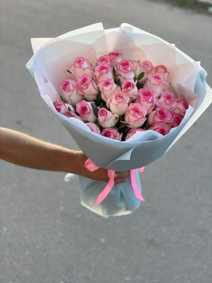 Professional floral arrangement in modern corporate setting